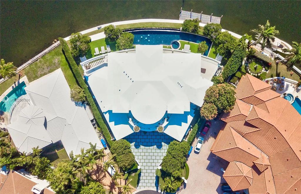 The Golden Beach Home is an impeccable estate set on an impressive 188 foot of pristine water frontage for entertaining now available for sale. This property located at 142 S Is, Golden Beach, Florida; offering 6 bedrooms and 9 bathrooms with over 7,500 square feet of living spaces.