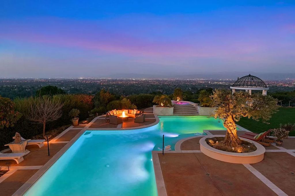 The Villa Amanecer - An Iconic Home in Los Gatos set on the eastern edge of a prominent ridgeline with panoramic views now available for sale. This home located at 16331 Matilija Dr, Los Gatos, California; offering 5 bedrooms and 9 bathrooms with over 11,500 square feet of living spaces.