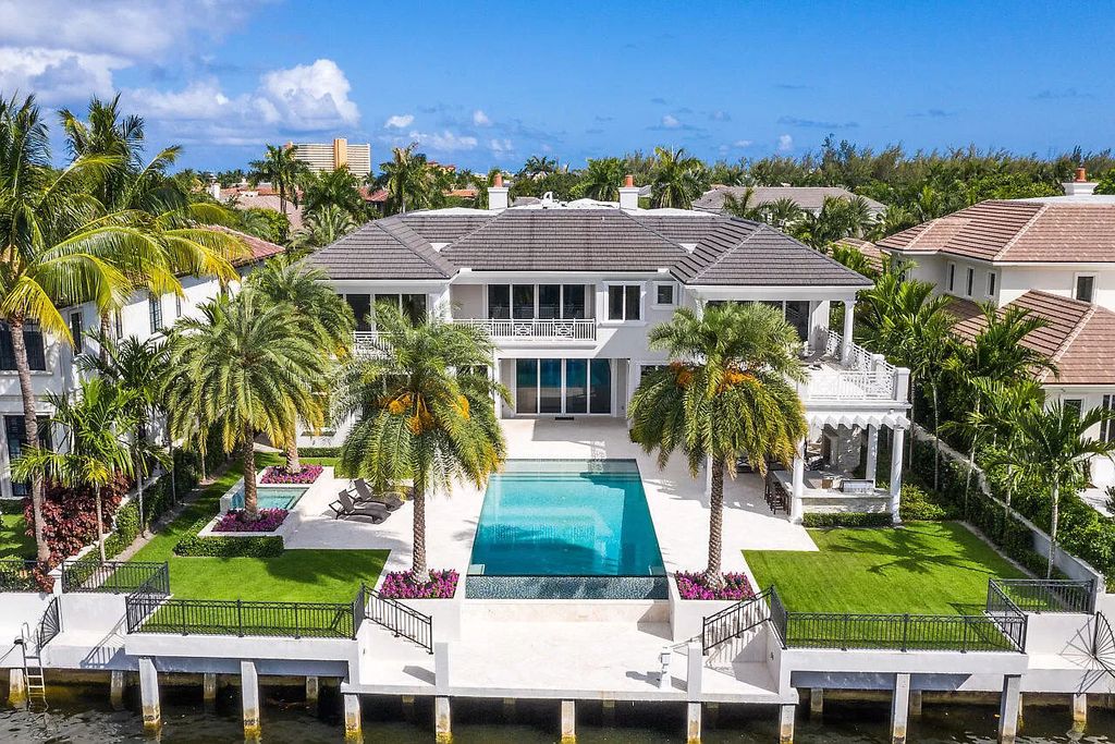 The Transitional Home in Boca Raton is a highly sought after newer custom waterfront estate with beautiful view of the outdoor oasis now available for sale. This home located at 311 E Key Palm Rd, Boca Raton, Florida; offering 6 bedrooms and 10 bathrooms with over 9,000 square feet of living spaces.