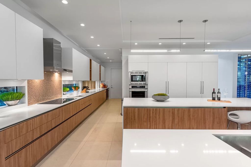 The Modern Home in Fort Lauderdale is a luxurious home offers Coherent living, work and entertainment spaces now available for sale. This home located at 310 SE 11th Ave, Fort Lauderdale, Florida; offering 5 bedrooms and 5 bathrooms with over 6,000 square feet of living spaces.