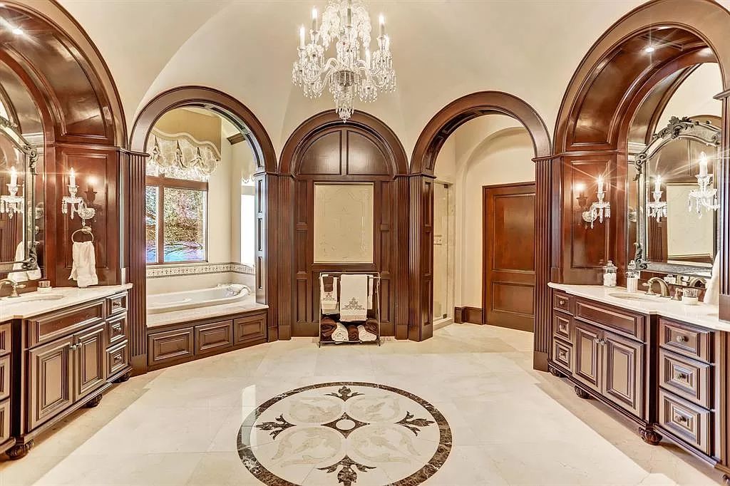 The Waterfront Home in Sugar Land is a palatial estate sits on its own private gated peninsula surrounded by water now available for sale. This home located at 11 Paradise Point Dr, Sugar Land, Texas; offering 6 bedrooms and 8 bathrooms with over 13,000 square feet of living spaces.