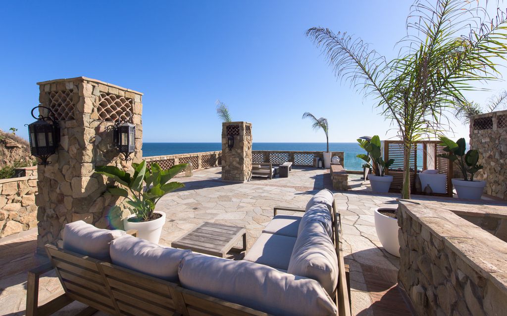 The Architectural Home in Malibu is a spectacular two-story beachfront villa with ocean, coastline, and island views now available for sale. This home located at 32852 Pacific Coast Hwy, Malibu, California; offering 4 bedrooms and 4 bathrooms with over 5,000 square feet of living spaces.