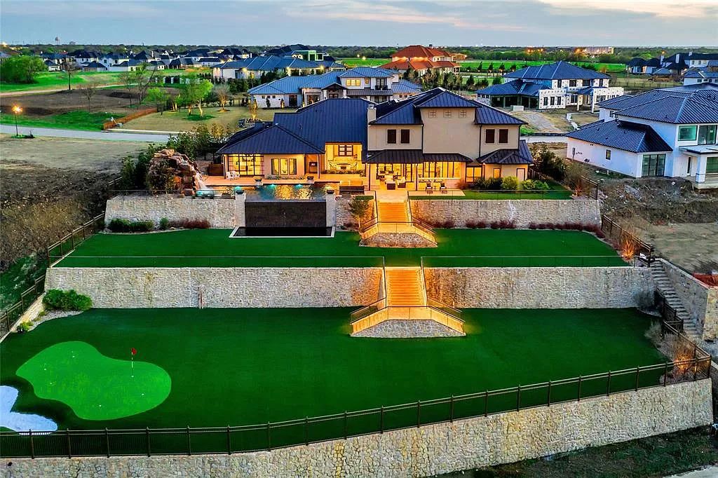 The Texas Home is a luxurious masterpiece situated in a prestigious, guard gated neighborhood with panoramic views now available for sale. This home located at 4012 Starling Dr, Frisco, Texas; offering 5 bedrooms and 7 bathrooms with over 9,800 square feet of living spaces.