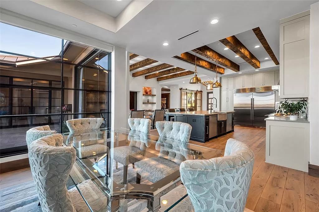 The Texas Home is a luxurious masterpiece situated in a prestigious, guard gated neighborhood with panoramic views now available for sale. This home located at 4012 Starling Dr, Frisco, Texas; offering 5 bedrooms and 7 bathrooms with over 9,800 square feet of living spaces.