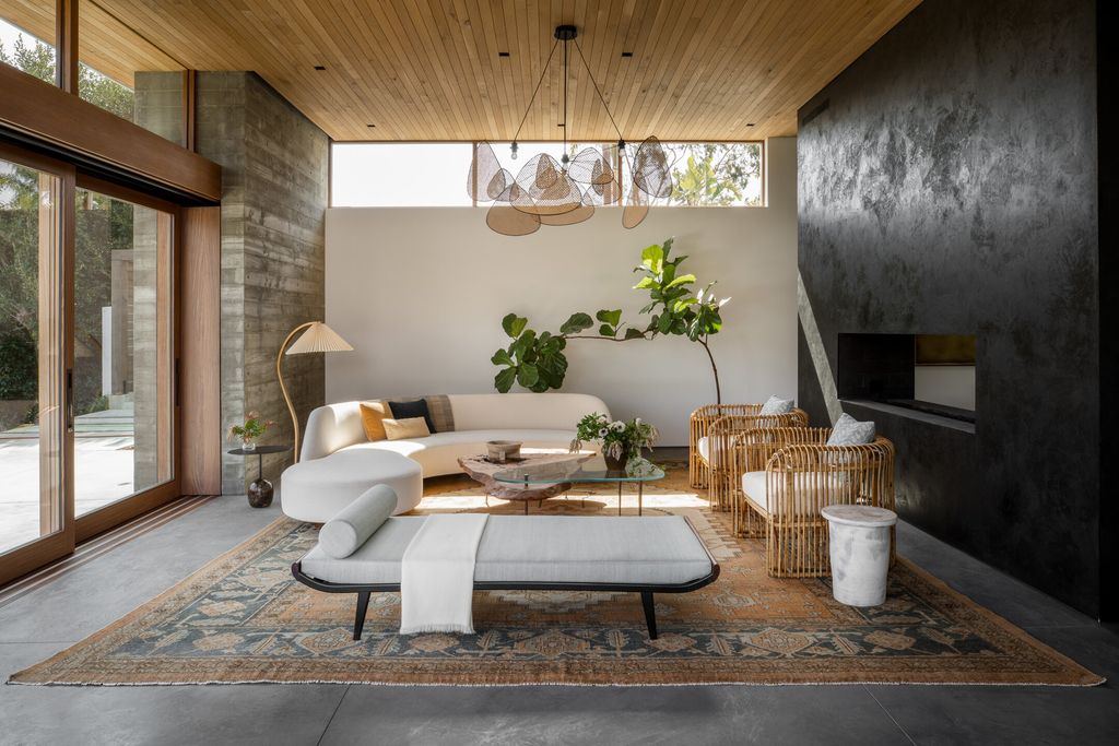 The Contemporary Home in Malibu is a private sanctuary of exceptional tranquility set at the end of a double-gated drive now available for sale. This home located at 6708 Wildlife Rd, Malibu, California; offering 6 bedrooms and 7 bathrooms with over 6,000 square feet of living spaces. 