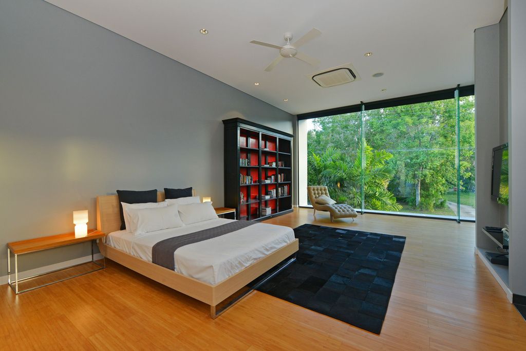 The Queensland Home is a stunning modern masterpiece with contemporary furnishings and bathed in natural light now available for rent. This home located at 50 Kewarra Street, Kewarra Beach, Queensland, Australia; offering 5 bedrooms and 7 bathrooms with over 1,200 square meter of living spaces.