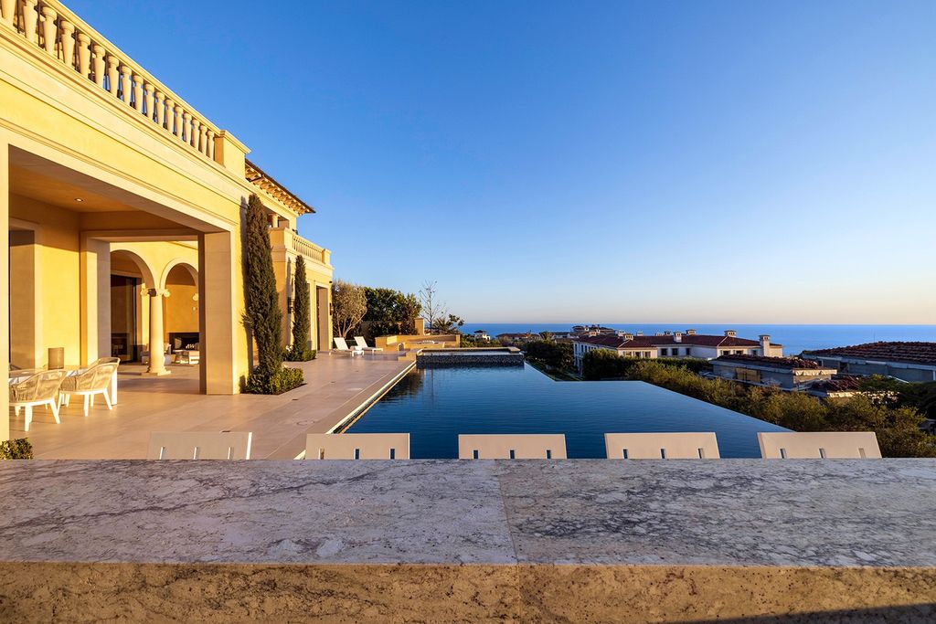 The Villa in Newport Beach is a newly constructed masterpiece boasting panoramic views overlooking the Pacific Ocean now available for sale. This home located at 16 Coral Rdg, Newport Beach, California; offering 7 bedrooms and 13 bathrooms with over 15,000 square feet of living spaces