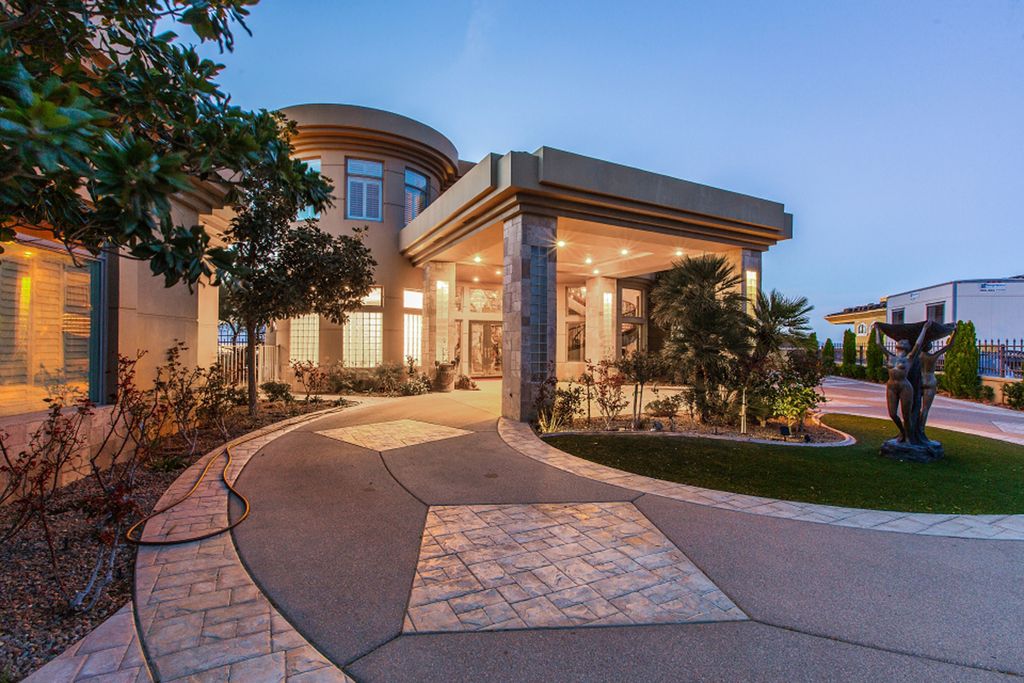The Trophy Property in Henderson is an unique Design, modern and curved custom home sit atop a 200' plateau parcel available for sale. This home located at 45 Club Vista Dr, Henderson, Nevada; offering 7 bedrooms and 9 bathrooms with over 11,000 square feet of living spaces.