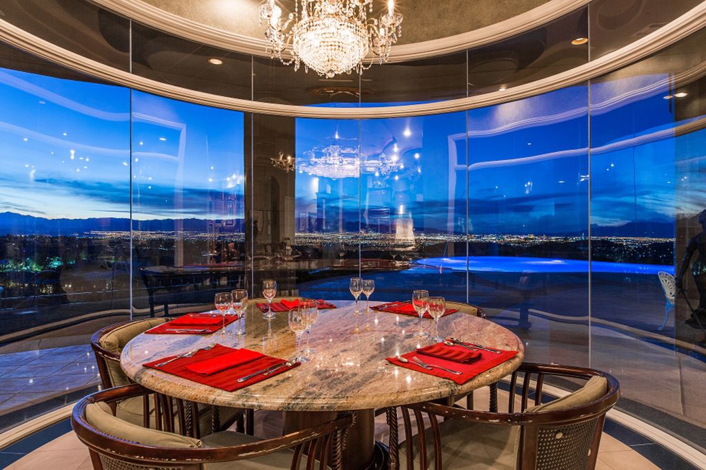 The Trophy Property in Henderson is an unique Design, modern and curved custom home sit atop a 200' plateau parcel available for sale. This home located at 45 Club Vista Dr, Henderson, Nevada; offering 7 bedrooms and 9 bathrooms with over 11,000 square feet of living spaces.