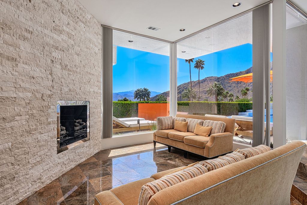 The Palm Springs Hills Modern Home is a iconic estate by John Walling and McCallum with incredible mountain and valley views now available for sale. This home located at 700 W Stevens Rd, Palm Springs, California; offering 6 bedrooms and 8 bathrooms with over 13,000 square feet of living spaces.