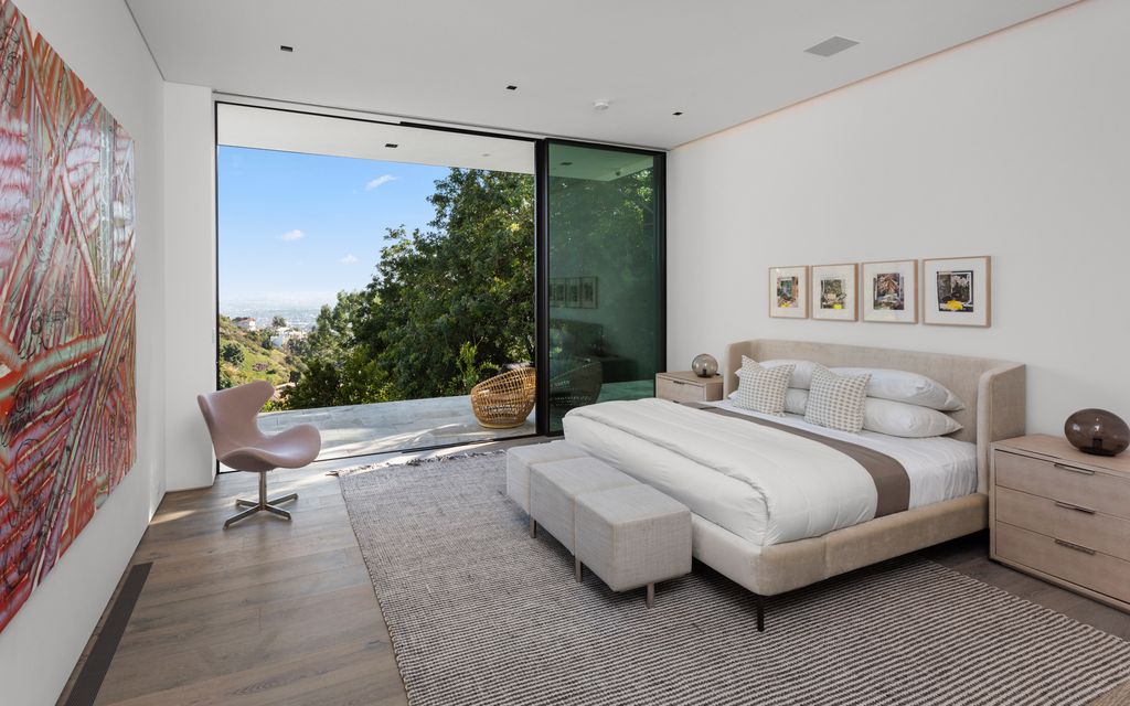 The World Class Beverly Hills Mansion is one of the most iconic architectural homes with impeccable design by SAOTA now available for sale. This home located at 1108 Wallace Rdg, Beverly Hills, California; offering 7 bedrooms and 14 bathrooms with over 18,000 square feet of living spaces.