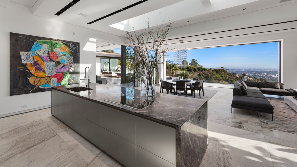 The World Class Beverly Hills Mansion is one of the most iconic architectural homes with impeccable design by SAOTA now available for sale. This home located at 1108 Wallace Rdg, Beverly Hills, California; offering 7 bedrooms and 14 bathrooms with over 18,000 square feet of living spaces.