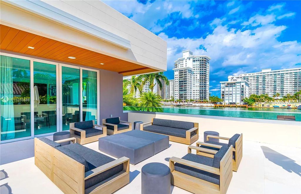 The Modern Waterfront Villa in Miami Beach is a luxurious home on Pine Tree Drive ideal for entertaining now available for sale. This home located at 5711 Pine Tree Dr, Miami Beach, Florida; offering 7 bedrooms and 9 bathrooms with over 8,000 square feet of living spaces.
