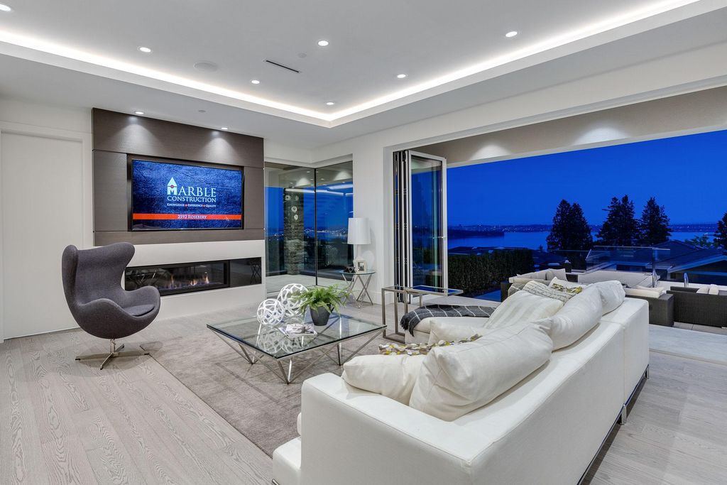 This Incredible View House in West Vancouver, Canada was executed by prestigious Marble Construction. It situated in the heart of Dundarave Village, Vancouver commanding 360 degree views of the ocean, mountains and city skyline