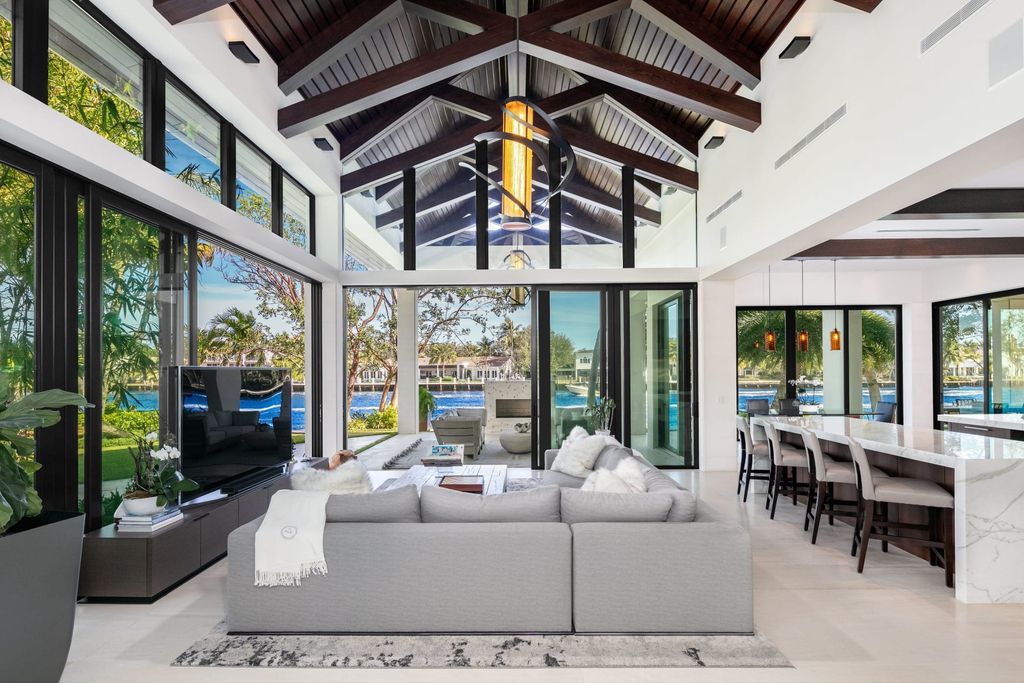 The Contemporary Mansion in Florida is a magnificent Balinese inspired point lot estate overlooking the Intracoastal now available for sale. This home located at 141 Bay Colony Dr, Fort Lauderdale, Florida; offering 6 bedrooms and 9 bathrooms with over 10,000 square feet of living spaces.