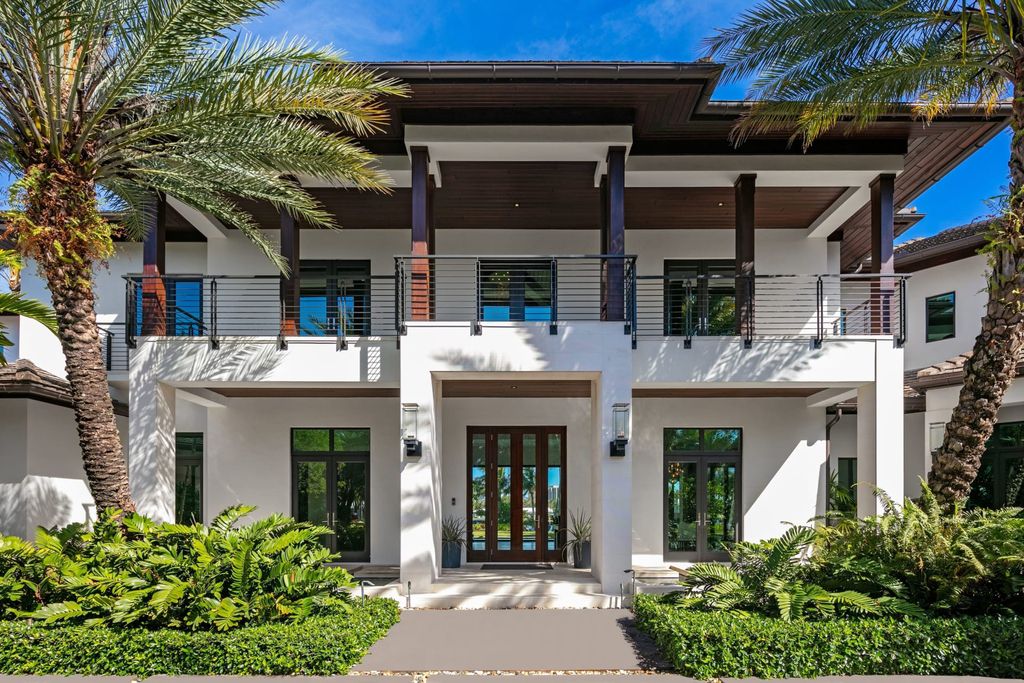 The Contemporary Mansion in Florida is a magnificent Balinese inspired point lot estate overlooking the Intracoastal now available for sale. This home located at 141 Bay Colony Dr, Fort Lauderdale, Florida; offering 6 bedrooms and 9 bathrooms with over 10,000 square feet of living spaces.