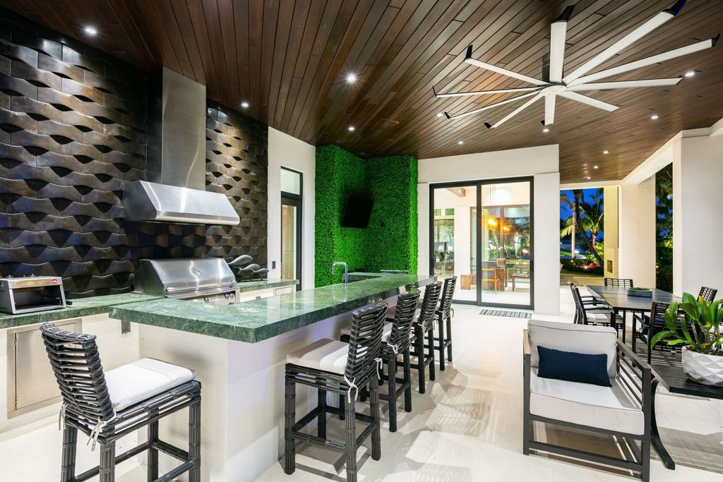 The Contemporary Mansion in Florida is a magnificent Balinese inspired point lot estate overlooking the Intracoastal now available for sale. This home located at 141 Bay Colony Dr, Fort Lauderdale, Florida; offering 6 bedrooms and 9 bathrooms with over 10,000 square feet of living spaces.