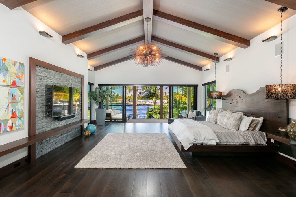 The Contemporary Mansion in Florida is a magnificent Balinese inspired point lot estate overlooking the Intracoastal now available for sale. This home located at 141 Bay Colony Dr, Fort Lauderdale, Florida; offering 6 bedrooms and 9 bathrooms with over 10,000 square feet of living spaces.