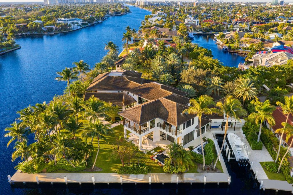 The Contemporary Mansion in Florida is a magnificent Balinese inspired point lot estate overlooking the Intracoastal now available for sale. This home located at 141 Bay Colony Dr, Fort Lauderdale, Florida; offering 6 bedrooms and 9 bathrooms with over 10,000 square feet of living spaces.