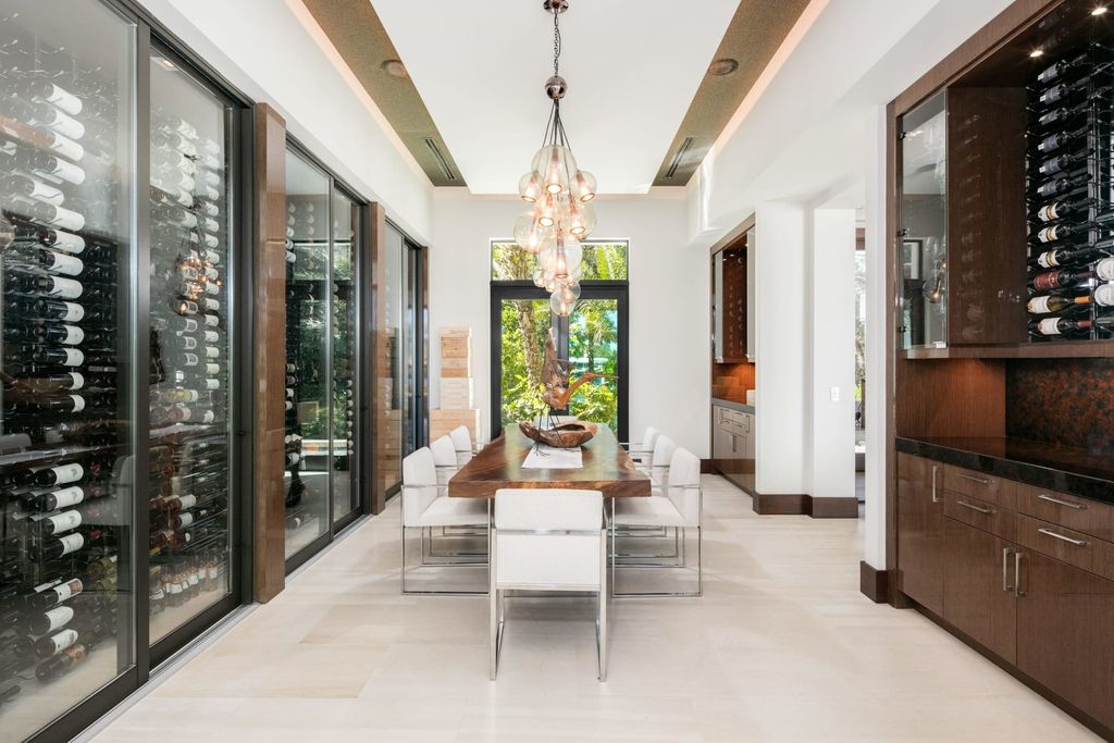 The Contemporary Mansion in Florida is a magnificent Balinese inspired point lot estate overlooking the Intracoastal now available for sale. This home located at 141 Bay Colony Dr, Fort Lauderdale, Florida; offering 6 bedrooms and 9 bathrooms with over 10,000 square feet of living spaces.