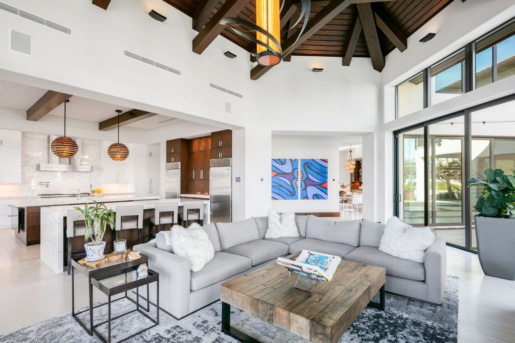 The Contemporary Mansion in Florida is a magnificent Balinese inspired point lot estate overlooking the Intracoastal now available for sale. This home located at 141 Bay Colony Dr, Fort Lauderdale, Florida; offering 6 bedrooms and 9 bathrooms with over 10,000 square feet of living spaces.