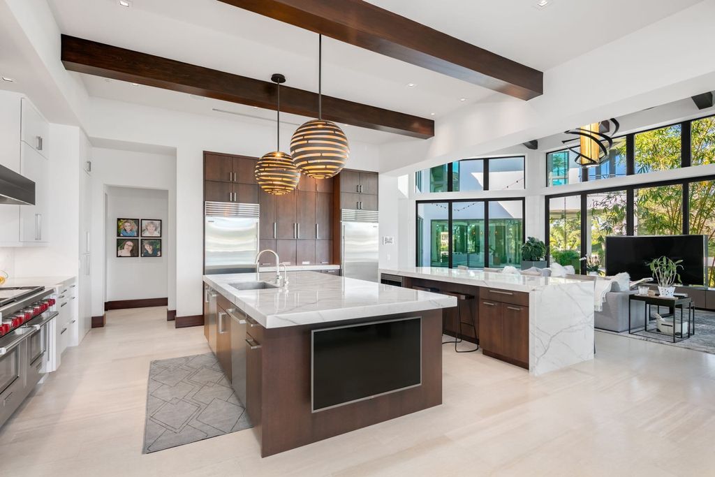 The Contemporary Mansion in Florida is a magnificent Balinese inspired point lot estate overlooking the Intracoastal now available for sale. This home located at 141 Bay Colony Dr, Fort Lauderdale, Florida; offering 6 bedrooms and 9 bathrooms with over 10,000 square feet of living spaces.