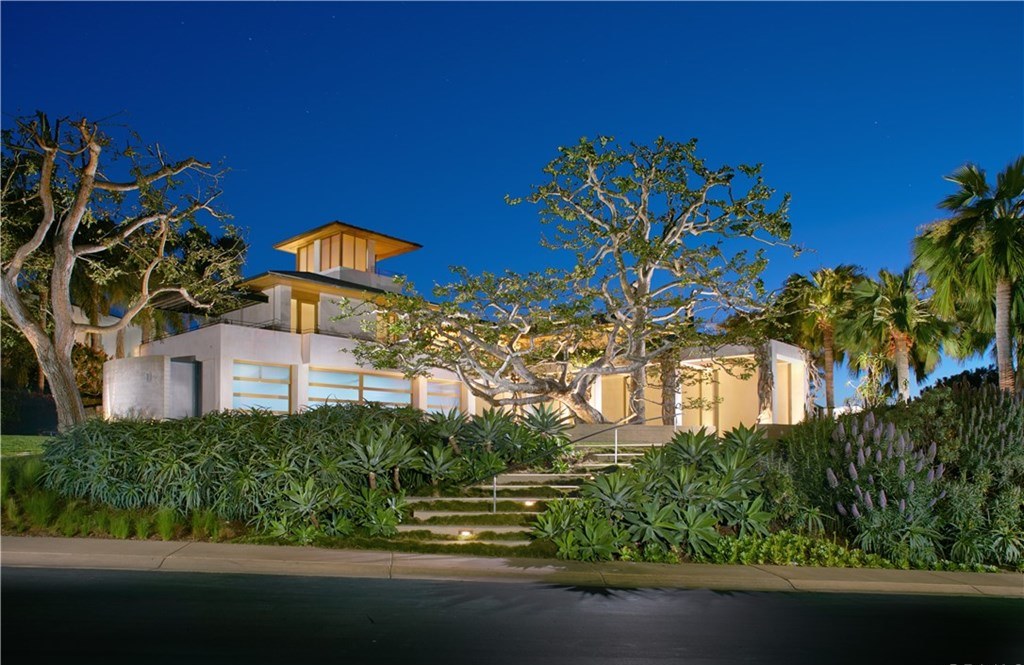 The Newport Coast Home is a an expansive estate that brings distinctive modernist elements to its ultra-exclusive location now available for sale. This home located at 1 Harbor Lgt, Newport Coast, California; offering 5 bedrooms and 7 bathrooms with over 8,000 square feet of living spaces.