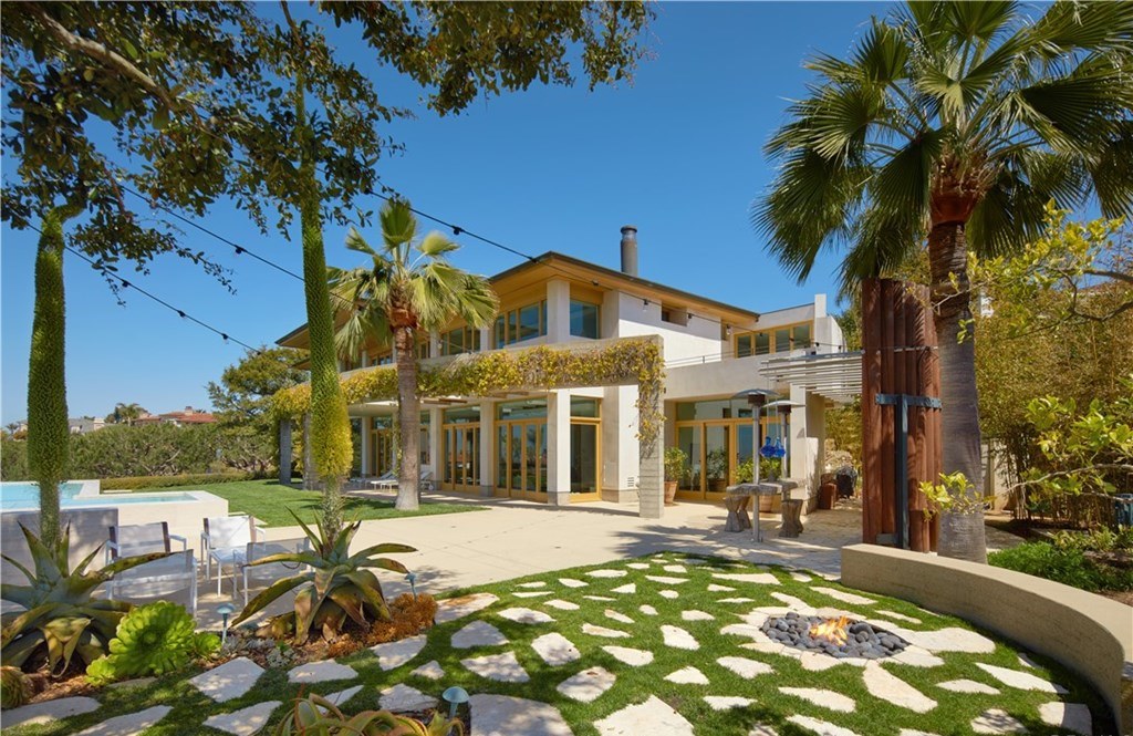 The Newport Coast Home is a an expansive estate that brings distinctive modernist elements to its ultra-exclusive location now available for sale. This home located at 1 Harbor Lgt, Newport Coast, California; offering 5 bedrooms and 7 bathrooms with over 8,000 square feet of living spaces.
