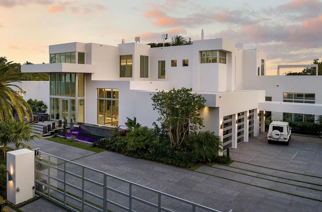 The Florida Contemporary Mansion is a luxurious masterpiece in the highly sought after enclave of Seminole Landing now available for sale. This home located at 1104 Seminole Blvd, North Palm Beach, Florida; offering 7 bedrooms and 8 bathrooms with over 17,000 square feet of living spaces. 