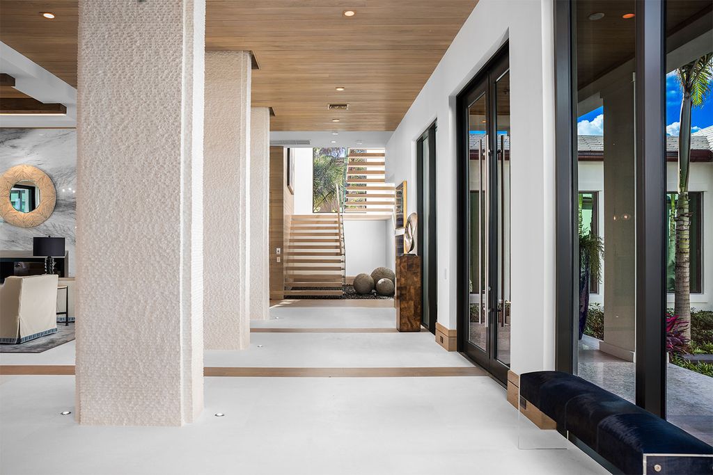 This Picturesque Ocean Views House in Florida built and designed by the award-winning team of Mark Timothy, Affiniti Architects, and Marc-Michaels Interior Design