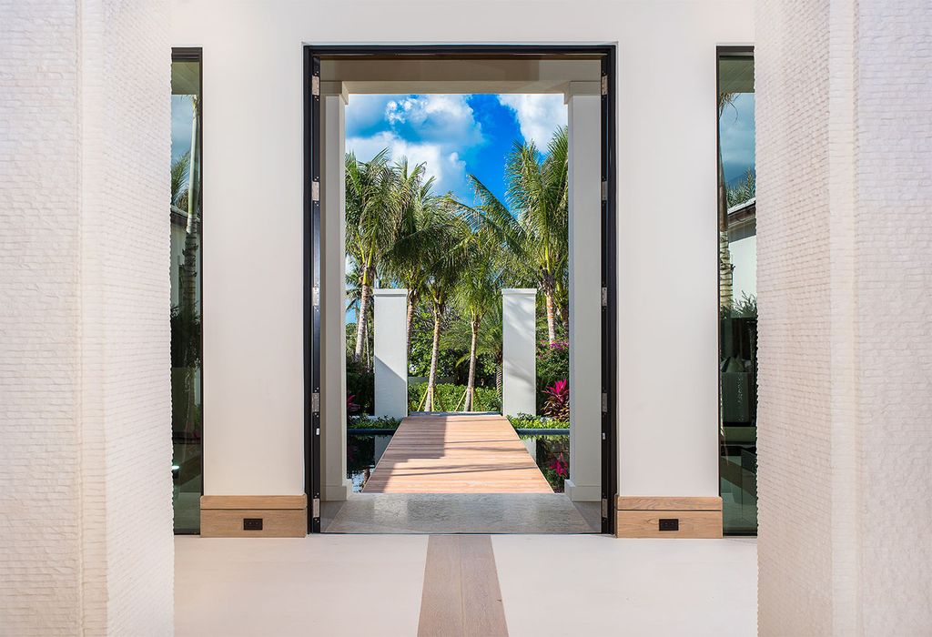 This Picturesque Ocean Views House in Florida built and designed by the award-winning team of Mark Timothy, Affiniti Architects, and Marc-Michaels Interior Design