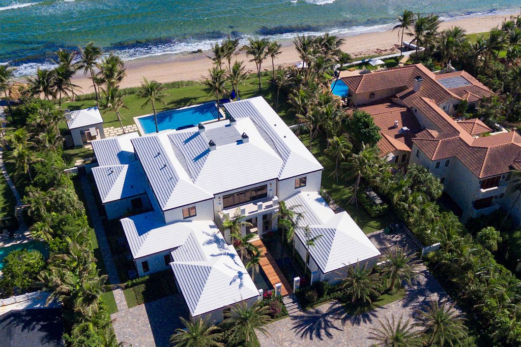 This Picturesque Ocean Views House in Florida built and designed by the award-winning team of Mark Timothy, Affiniti Architects, and Marc-Michaels Interior Design