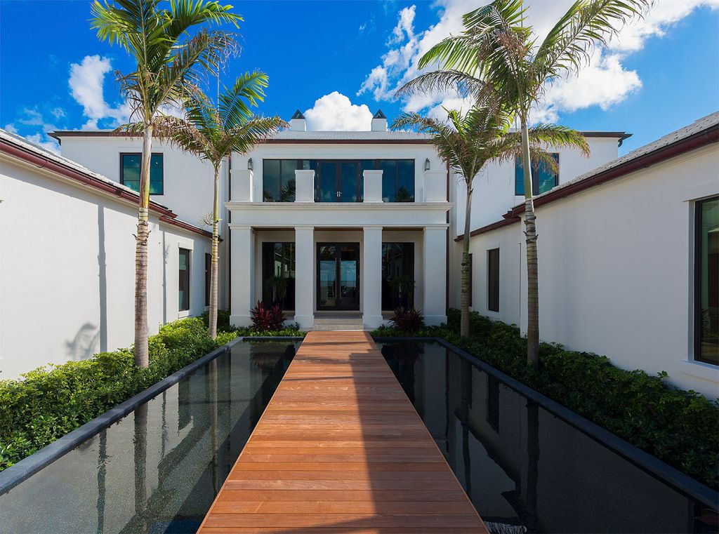 This Picturesque Ocean Views House in Florida built and designed by the award-winning team of Mark Timothy, Affiniti Architects, and Marc-Michaels Interior Design