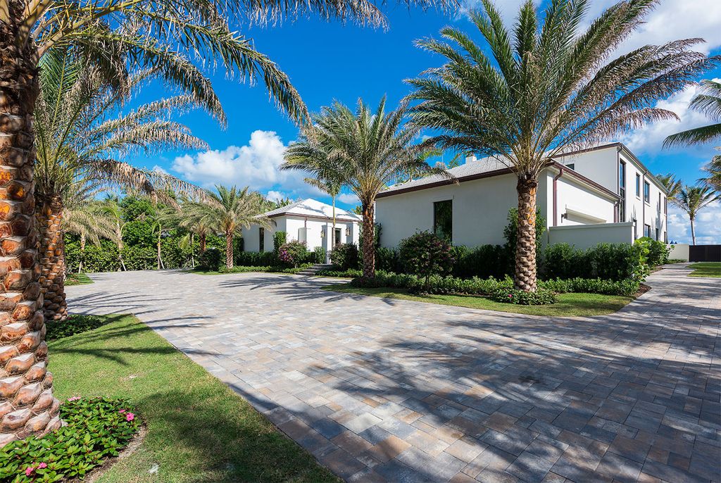 This Picturesque Ocean Views House in Florida built and designed by the award-winning team of Mark Timothy, Affiniti Architects, and Marc-Michaels Interior Design