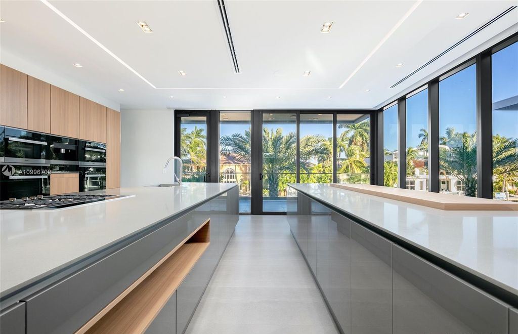 The Fort Lauderdale Home is post minimalist modern where sleek art meets architecture has exciting new finishes now available for sale. This home located at 440 Mola Ave, Fort Lauderdale, Florida; offering 5 bedrooms and 5 bathrooms with over 6,500 square feet of living spaces.