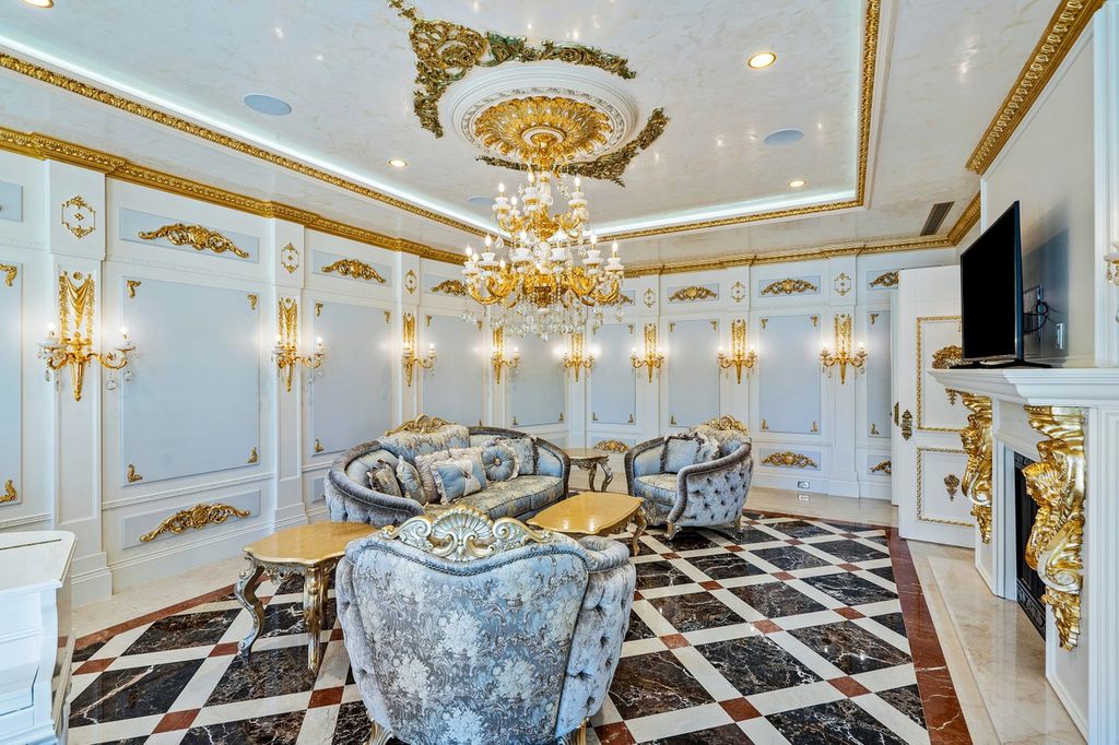 The Florida Mansion designed in Classic Venetian Style with all interior walls and ceilings are artisan crafted venetian plaster with gold leaf inlays now available for sale. This home located at 4200 NE 31st Ave, Lighthouse Point, Florida; offering 7 bedrooms and 9 bathrooms with over 9,000 square feet of living spaces.