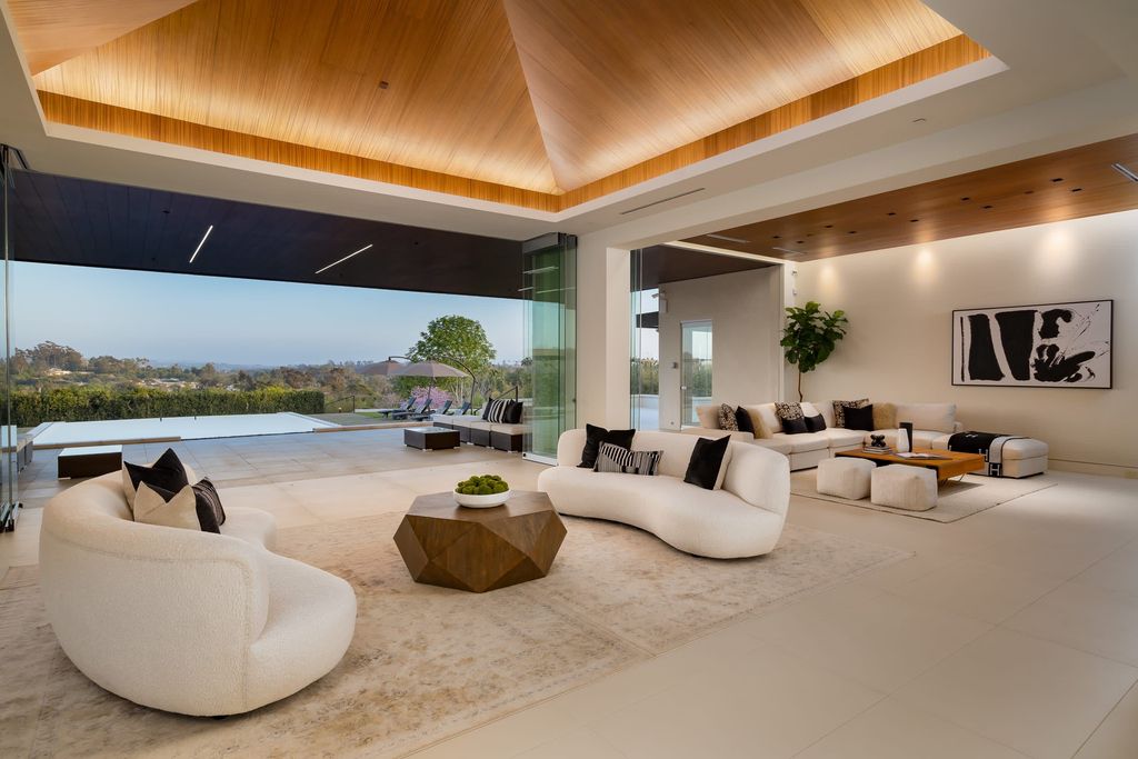 The Home in Rancho Santa Fe is an architectural masterpiece set on 4 acres of gorgeous grounds of panoramic views now available for sale. This home located at 18315 Lago Vis, Rancho Santa Fe, California; offering 7 bedrooms and 12 bathrooms with over 11,500 square feet of living spaces.