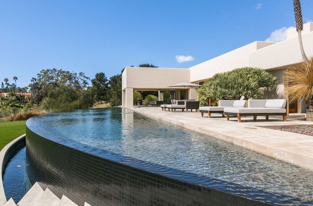 The Rancho Santa Fe Home is amazing contemporary work of art for entertainment with views of mountains and valleys now available for sale. This home located at 16528 Los Barbos, Rancho Santa Fe, California; offering 6 bedrooms and 6 bathrooms with over 8,000 square feet of living spaces.
