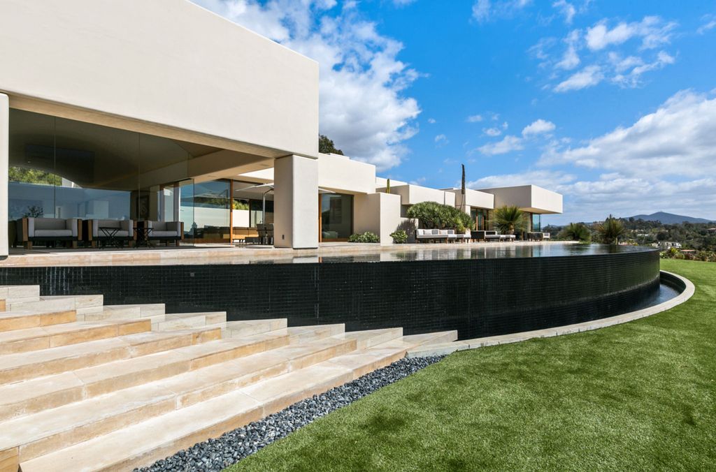 The Rancho Santa Fe Home is amazing contemporary work of art for entertainment with views of mountains and valleys now available for sale. This home located at 16528 Los Barbos, Rancho Santa Fe, California; offering 6 bedrooms and 6 bathrooms with over 8,000 square feet of living spaces.