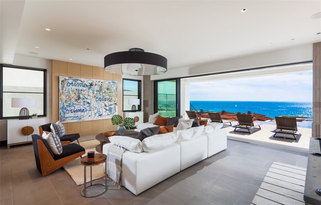 The Dana Point Home is an unparalleled custom estate redefines luxurious seaside living above the mercurial Pacific Ocean now available for sale. This home located at 17 Beach View Ave, Dana Point, California; offering 5 bedrooms and 9 bathrooms with over 8,300 square feet of living spaces.