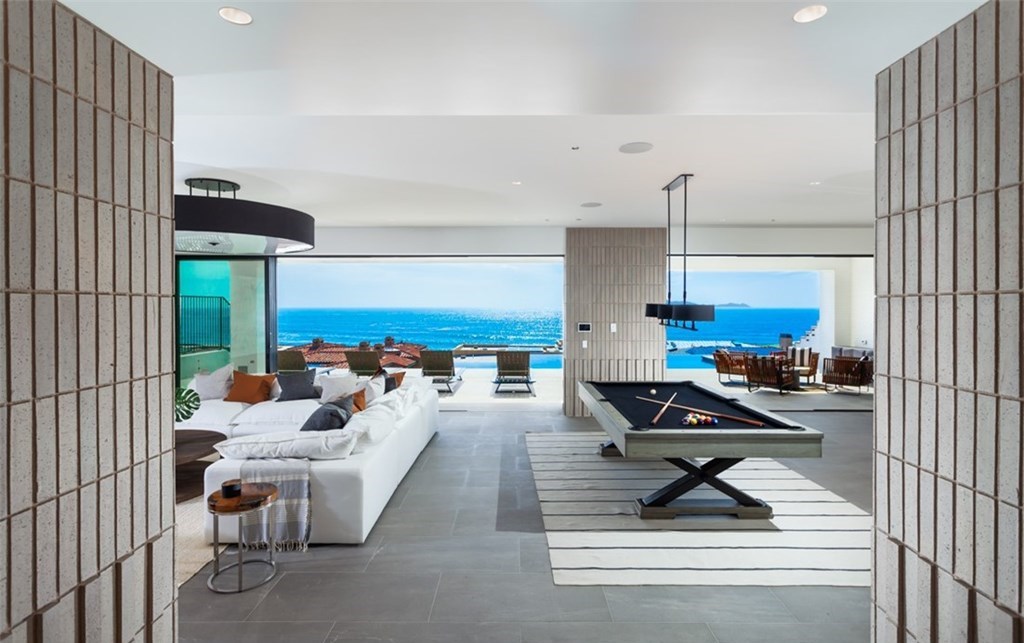 The Dana Point Home is an unparalleled custom estate redefines luxurious seaside living above the mercurial Pacific Ocean now available for sale. This home located at 17 Beach View Ave, Dana Point, California; offering 5 bedrooms and 9 bathrooms with over 8,300 square feet of living spaces.