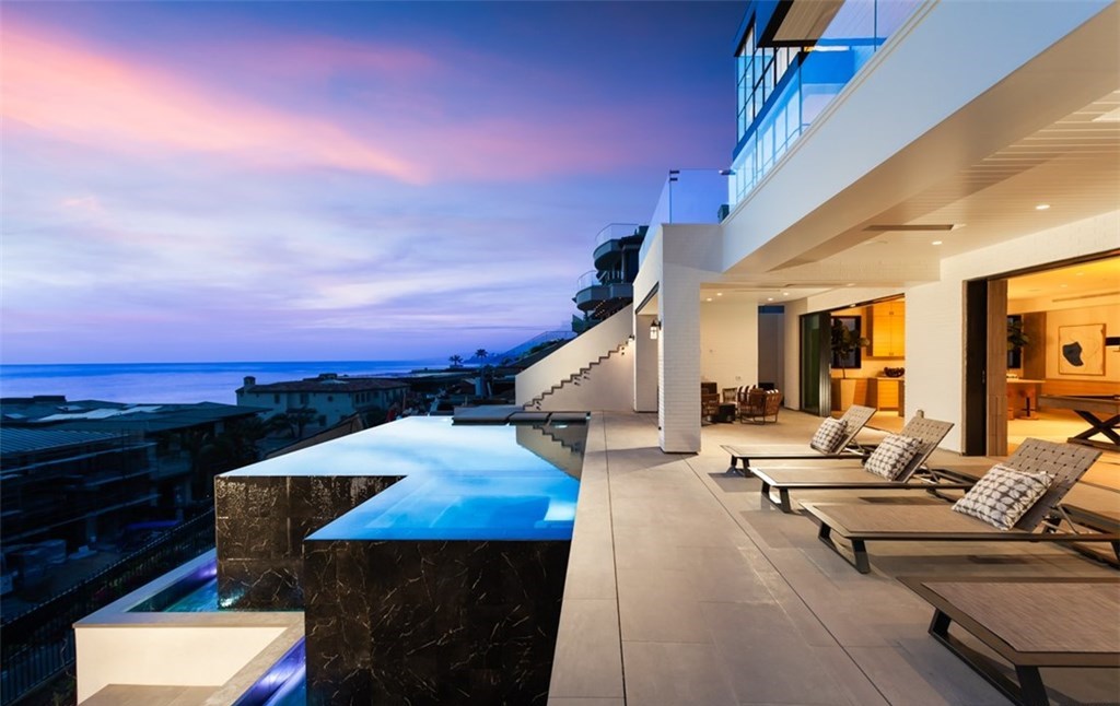 The Dana Point Home is an unparalleled custom estate redefines luxurious seaside living above the mercurial Pacific Ocean now available for sale. This home located at 17 Beach View Ave, Dana Point, California; offering 5 bedrooms and 9 bathrooms with over 8,300 square feet of living spaces.