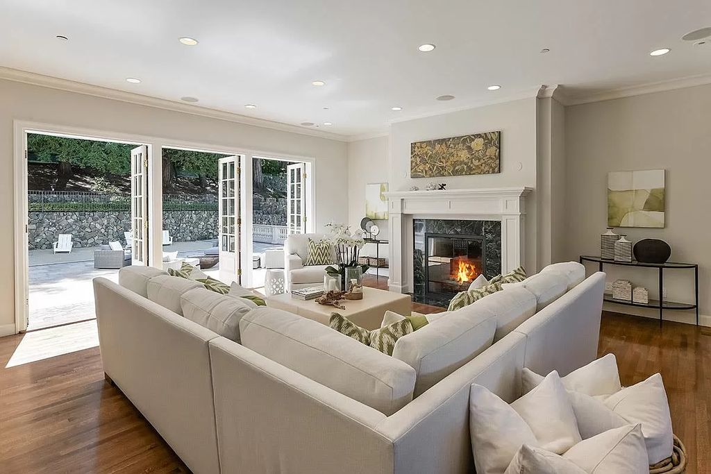 The Hillsborough Home is a private estate is located amongst an impressive assemblage of residences featuring sweeping bay views now available for sale. This home located at 3080 Ralston Ave, Hillsborough, California