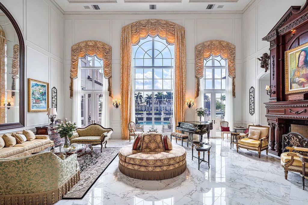 The Home in Boca Raton is a majestic Venetian inspired estate features exquisite living and entertaining spaces now available for sale. This home located at 1936 Royal Palm Way, Boca Raton, Florida; offering 3 bedrooms and 7 bathrooms with over 7,800 square feet of living spaces.