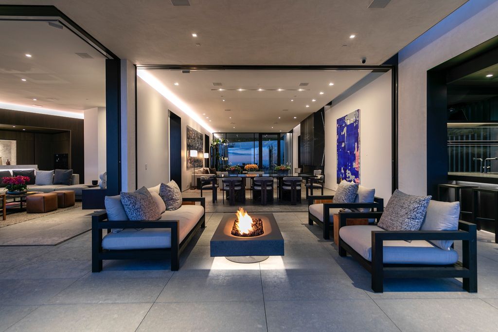 The Mansion in Beverly Hills is a spectacular hillside glass-walled sanctuary with Trousdale Estates most explosive panoramic city to ocean views now available for sale. This home located at 514 Chalette Dr, Beverly Hills, California; offering 6 bedrooms and 11 bathrooms with over 12,000 square feet of living spaces.
