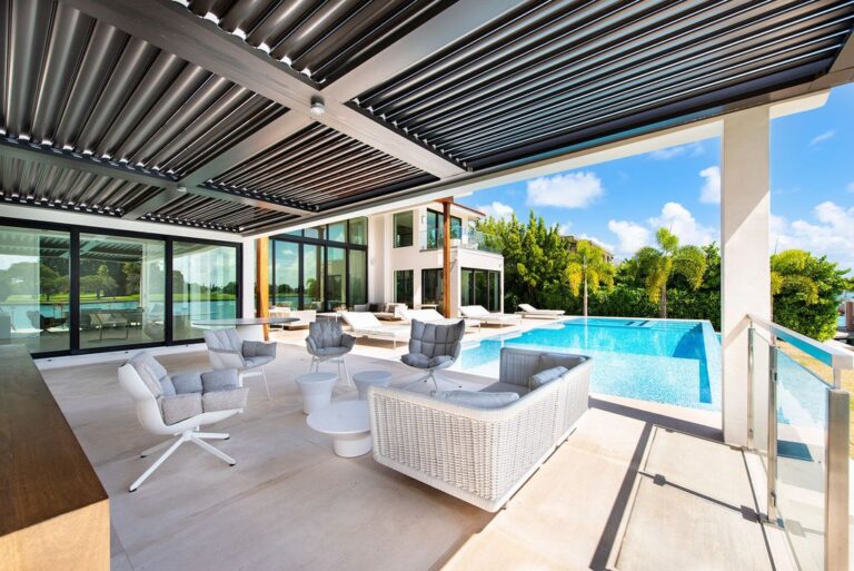 Image showcasing Stunning Luxurious Waterfront Home in Bay Harbor Islands Sells for $15M