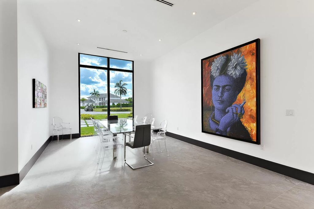 The Modern Home in Welling ton is a truly spectacular new construction modern home on a waterfront lot in the covered Cypress Island Way now available for sale. This home located at 12533 Cypress Island Way, Wellington, Florida