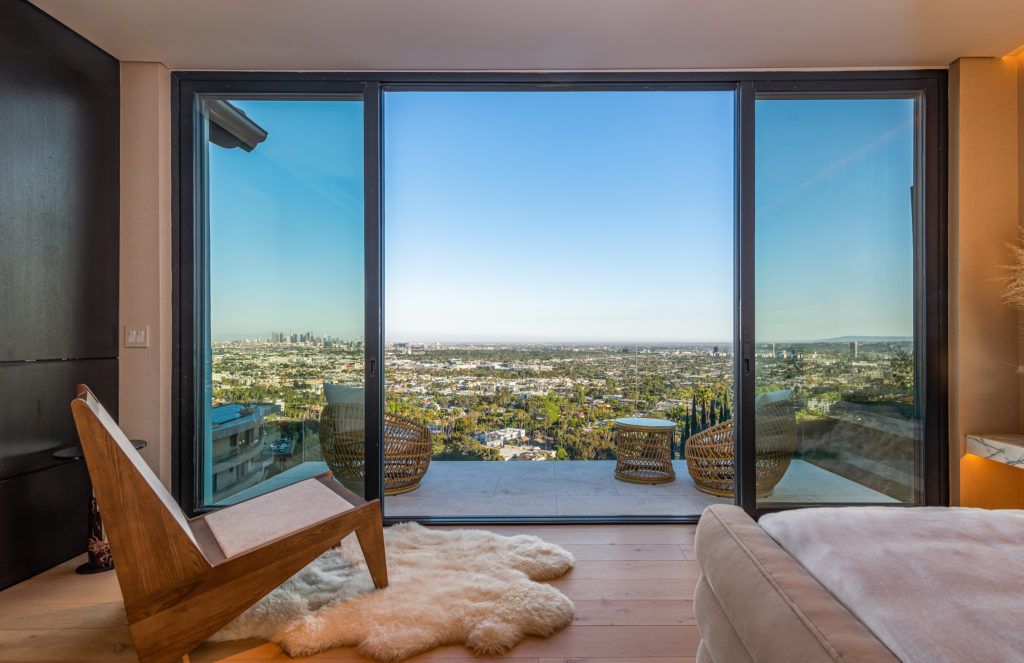 The Contemporary Home in the Hollywood Hills offers spectacular city views, abundant amenities, and a chic Los Angeles lifestyle now available for sale. This home located at 7846 Granito Dr, Los Angeles, California