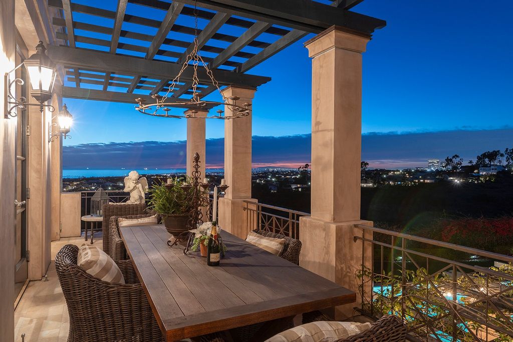 The Newport Beach Villa is an ultra-private retreat on an extraordinary oversized lot encompassing a front row span of unimpeded view now available for sale. This home located at 3 Rim Rdg, Newport Beach, California; offering 6 bedrooms and 8 bathrooms with over 11,300 square feet of living spaces.