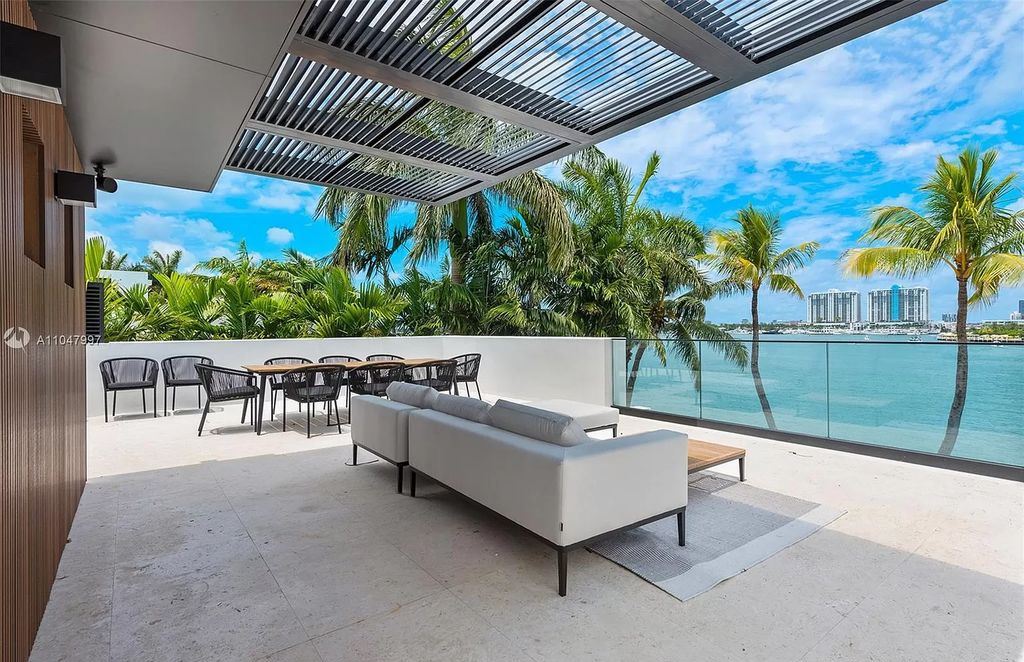 The Modern Waterfront Home in Miami Beach is a luxurious estate with panoramic views of south beach developed and built by Andian Group now available for sale. This home located at 247 E Rivo Alto Dr, Miami Beach, Florida
